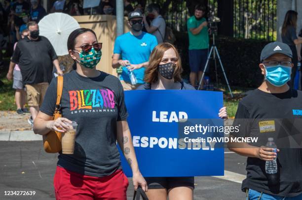 Employees of the video game company, Activision Blizzard, hold a walkout and protest rally to denounce the companys response to a California...