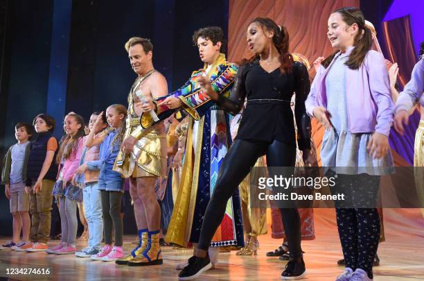 Jason Donovan, Jac Yarrow and Alexandra Burke bow at the curtain call during the press night performance of "Joseph And The Amazing Technicolor...
