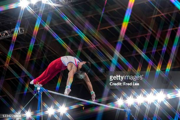 Artur Dalaloyan of Team Russian Olympic Committee competes competes on parallel bars during the Men's All-Around Final on day five of the Tokyo 2020...