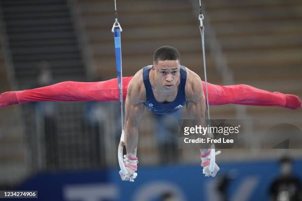 Joe Fraser of Team Great Britain competes competes on parallel bars during the Men's All-Around Final on day five of the Tokyo 2020 Olympic Games at...