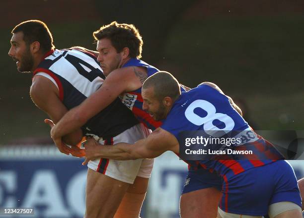 Ben Waite of the Scorpions is tackled during the VFL quarter final match between Port Melbourne and Casey Scorpions at TEAC Oval on September 3, 2011...