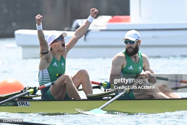 Ireland's Fintan McCarthy and Paul O'donovan celebrate their win in the lightweight men's double sculls final during the Tokyo 2020 Olympic Games at...