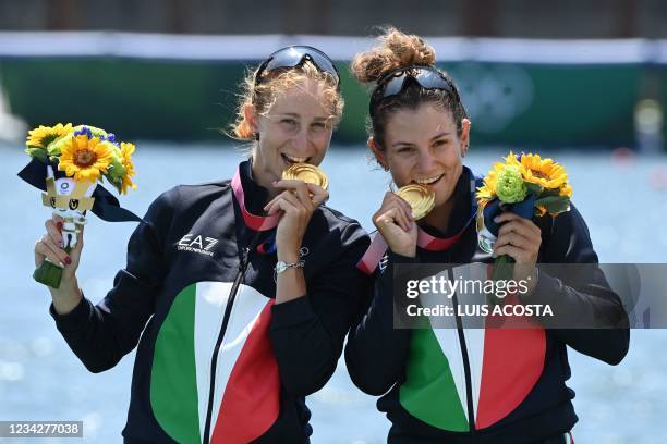 Gold medallists Italy's Valentina Rodini and Federica Cesarini pose on the podium following the lightweight women's double sculls final during the...