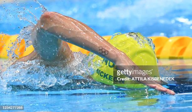 Australia's Emma McKeon competes to win a semi-final of the women's 100m freestyle swimming event during the Tokyo 2020 Olympic Games at the Tokyo...