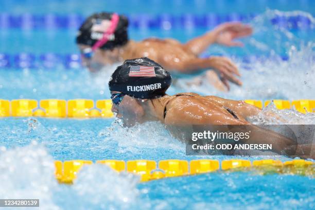 S Hali Flickinger and USA's Regan Smith compete in the final of the women's 200m butterfly swimming event during the Tokyo 2020 Olympic Games at the...