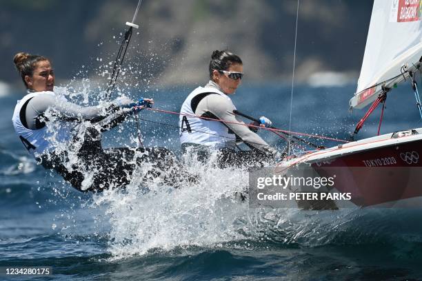 Brazil's Ana Luiza Barbachan and Fernanda Oliveira compete in the women's two-person dinghy 470 race during the Tokyo 2020 Olympic Games sailing...