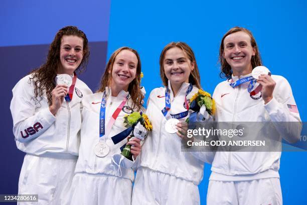 Silver medallists USA's Kathleen Ledecky, USA's Allison Schmitt, USA's Paige Madden, and USA's Kathryn McLaughlin pose with their medals after...