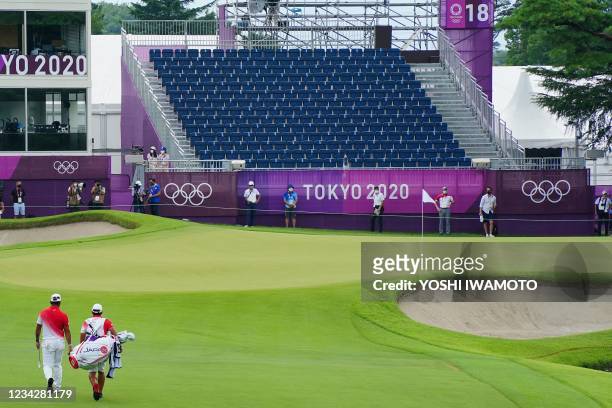 General view of the 18th green in round 1 of the mens golf individual stroke play during the Tokyo 2020 Olympic Games at the Kasumigaseki Country...