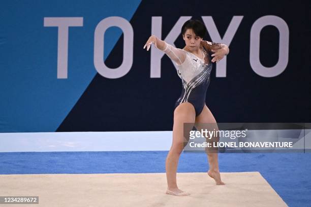 Japan's Mai Murakami competes in the floor event of the artistic gymnastics women's all-around final during the Tokyo 2020 Olympic Games at the...