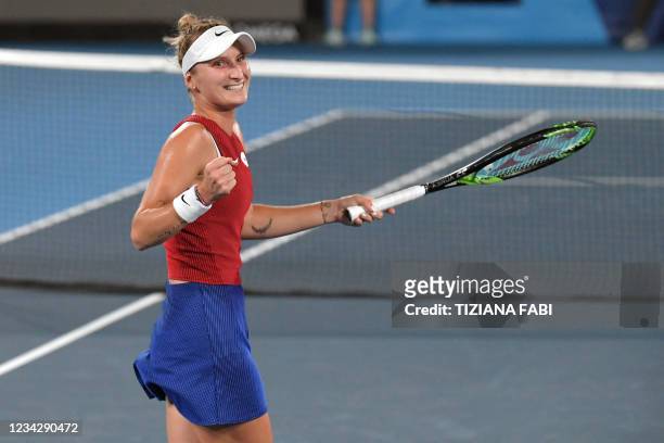 Czech Republic's Marketa Vondrousova celebrates beating Ukraine's Elina Svitolina in their Tokyo 2020 Olympic Games women's singles semifinal tennis...