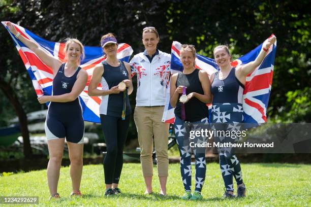 Double Olympic gold medalist Heather Stanning poses for a photograph with rowers at Bristol Ariel Rowing Club on July 29, 2021 in Bristol, England....