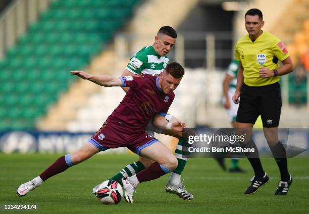 Dublin , Ireland - 23 July 2021; Mikie Rowe of Galway United and Gary O'Neill of Shamrock Rovers during the FAI Cup first round match between...