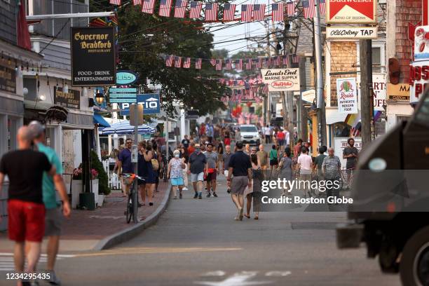 Provincetown, MA Foot traffic along Commercial street in Provincetown, MA on July 20, 2021. Provincetown officials have issued a new mask-wearing...