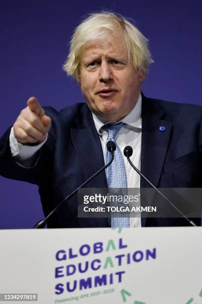 Britain's Prime Minister Boris Johnson gestures as he speaks during the closing ceremony on the second day of the Global Education Summit in London...