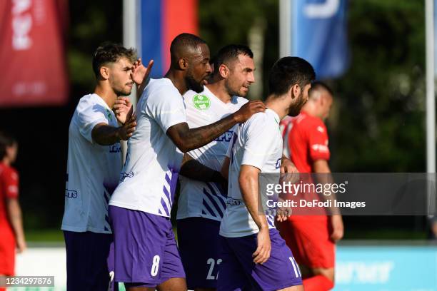 Junior Tallo of Ujpest FC celebrates after scoring his team's first goal with teammates during the UEFA Europa Conference League Second Qualifying...
