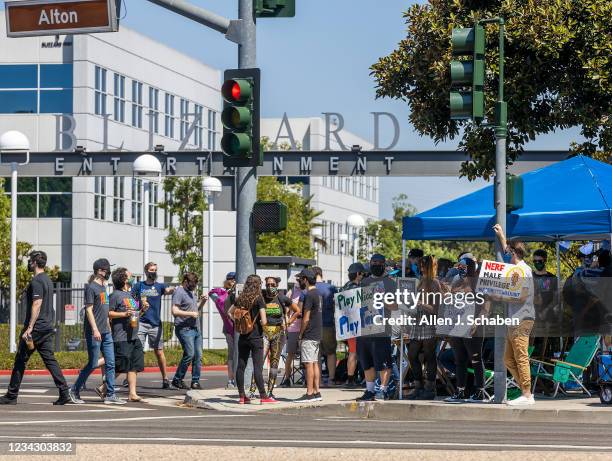 Several hundred Activision Blizzard employees stage a walkout which they say is in a response from company leadership to a lawsuit highlighting...