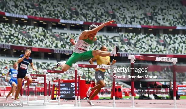 Tokyo , Japan - 30 July 2021; Thomas Barr of Ireland in action during the his heat of the men's 400 metre hurdles at the Olympic Stadium during the...