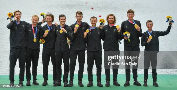 Tokyo , Japan - 30 July 2021; New Zealand Men's Eight celebrate with their gold medals after victory in the Men's Eight final at the Sea Forest...