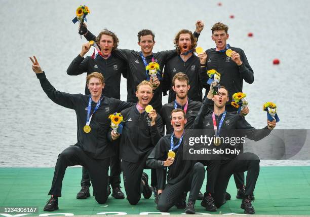 Tokyo , Japan - 30 July 2021; New Zealand Men's Eight celebrates with their gold medals after vicotry in the Men's Eight final at the Sea Forest...