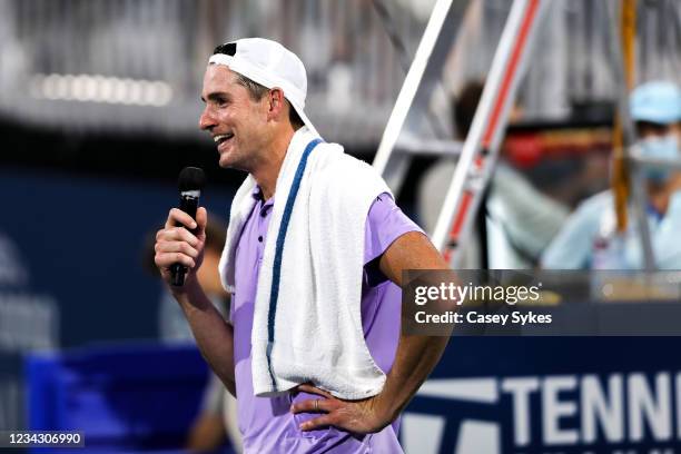 John Isner of the United States speaks during an interview following his victory over Jack Sock of the United States in a match at the Truist Atlanta...