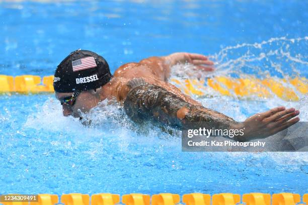 Caeleb Dressel of USA swims Men's 100m Butterfly to qualify for Final at semifinal on day seven of the Tokyo 2020 Olympic Games at Tokyo Aquatics...