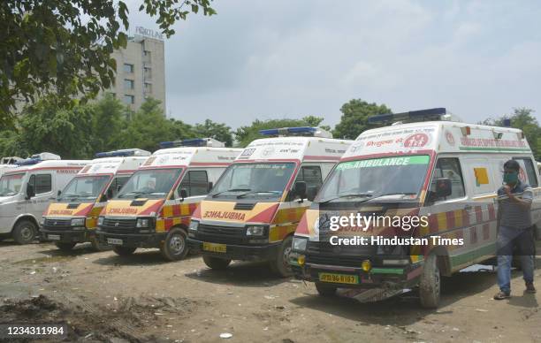 Ambulances parked as operators workers at Sanjay Nagar Hospital sit on protest demanding an end to the contract system, on July 29, 2021 in...