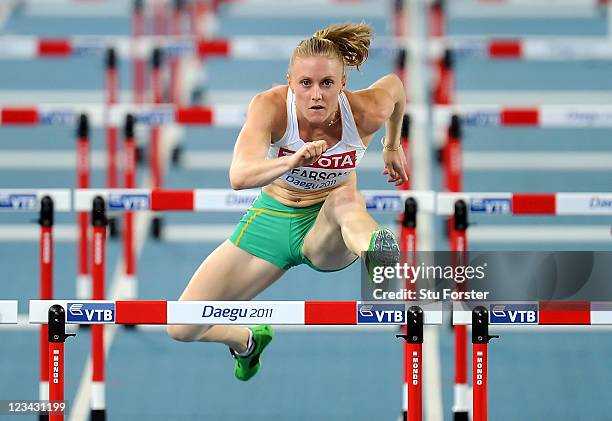 Sally Pearson of Australia competes in the women's 100 metres hurdles semi finals during day eight of the 13th IAAF World Athletics Championships at...
