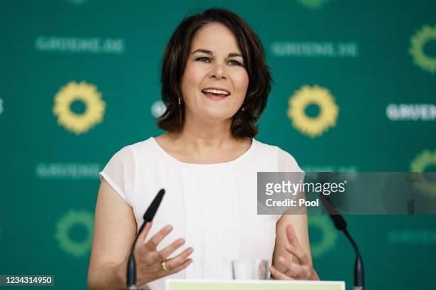 Green party co-chairwoman and top candidate for the upcoming federal elections Annalena Baerbock speaks during a press conference on July 30, 2021 in...