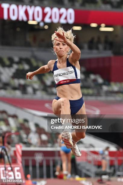 Greece's Paraskevi Papachristou competes in the women's triple jump qualification during the Tokyo 2020 Olympic Games at the Olympic Stadium in Tokyo...
