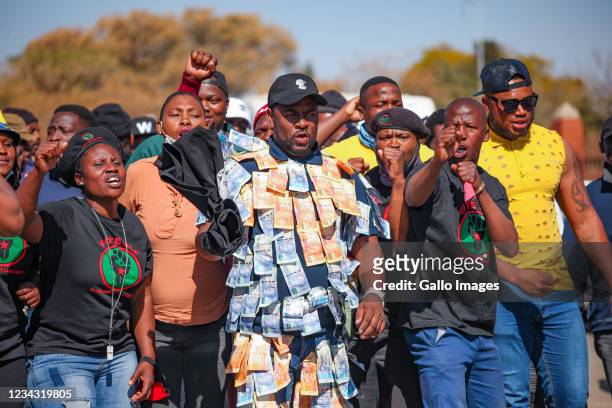 Supporters of Former Ukhozi FM presenter Ngizwe Mchunu outside the Randburg Magistrate's Court on July 29, 2021 in Johannesburg, South Africa. It is...