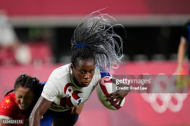 Seraphine Okemba of Team France is tackled by Keyi Chen of Team China in the Women's Quarter Final match between Team France and Team China during...