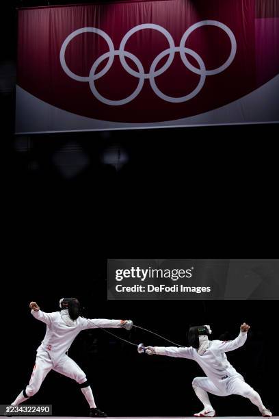 Minghao Lan of China and Sangyoung Park of Korea compete in the Men's Epee Team Bronze Medal Match between Republic of Korea and China on day seven...