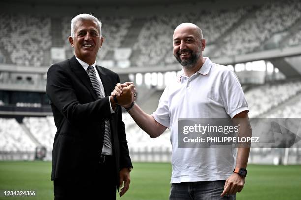 Girondins de Bordeaux's newly appointed Bosnian-Swiss headcoach Vladimir Petkovic and Girondins de Bordeaux's president Gerard Lopez pose for...
