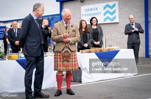 Britain's Prince Charles, Prince of Wales officially opens the Lerwick Fishmarket, Mair's Quay and the Scalloway Fish Market, at Shetland Seafood...