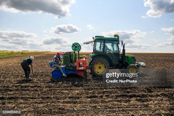 Modern agricultural machinery on a farm field in Vinnytsia region, Ukraine. July 2021