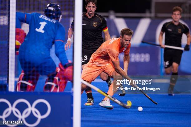 Jeroen Hertzberger of Netherlands controls the ball during the Men's Pool B - Hockey Match between Germany and Netherlands on day seven of the Tokyo...