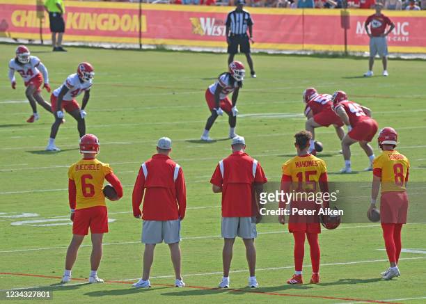 Quarterbacks Patrick Mahomes, Anthony Gordon and Shane Buechele of the Kansas City Chiefs look on during drills at training camp at Missouri Western...