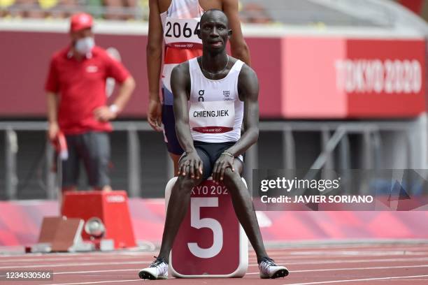 Refugee Olympic Team's James Nyang Chiengjiek prepares to compete in the men's 800m heats during the Tokyo 2020 Olympic Games at the Olympic Stadium...