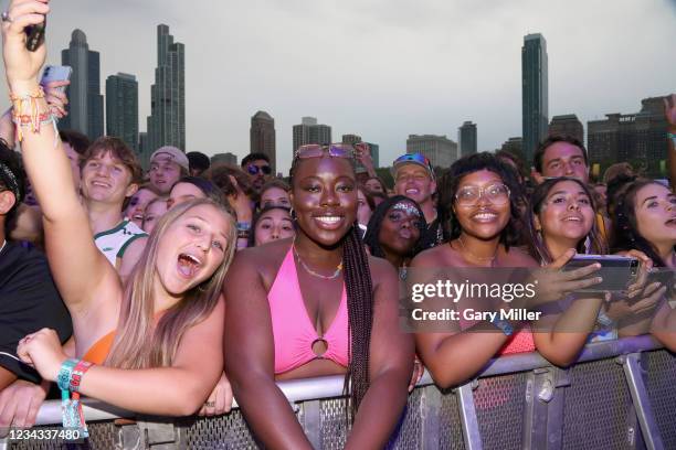 Festival-goers are seen during day two of the 30th anniversary of Lollapalooza at Grant Park on July 30, 2021 in Chicago, Illinois.