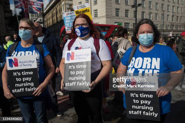 Staff prepare to march from St Thomas' Hospital to Downing Street to protest against the NHS Pay Review Body's recommendation of a 3% pay rise for...