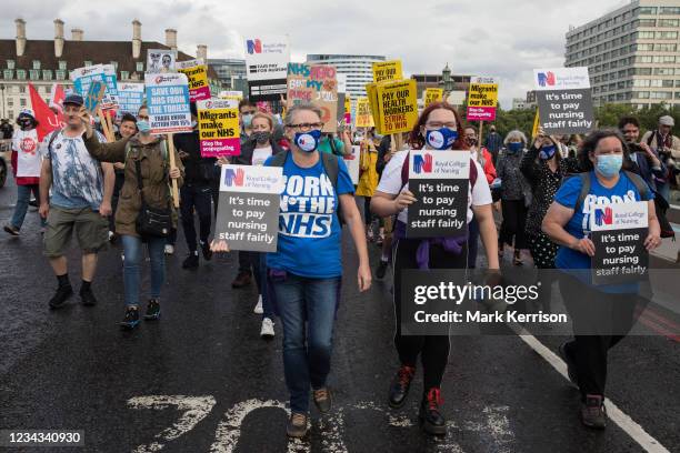 Staff march from St Thomas' Hospital to Downing Street to protest against the NHS Pay Review Body's recommendation of a 3% pay rise for NHS staff in...