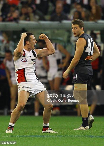 Stephen Milne of the Saints celebrates winning the round 24 AFL match between the Carlton Blues and the St Kilda Saints at the Melbourne Cricket...