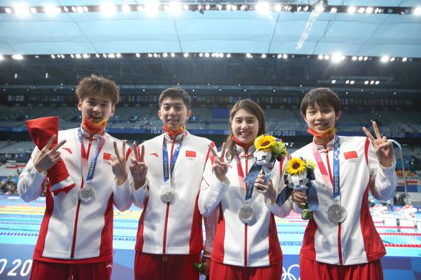 Xu Jiayu, Yan Zibei, Zhang Yufei and Yang Junxuan from L to R of China pose after the awarding ceremony for mixed 4x100m medley relay final of...