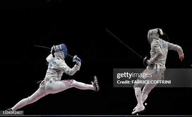 Italy's Michela Battistoni compete against South Korea's Kim Jiyeon in the womens team sabre bronze medal bout during the Tokyo 2020 Olympic Games at...