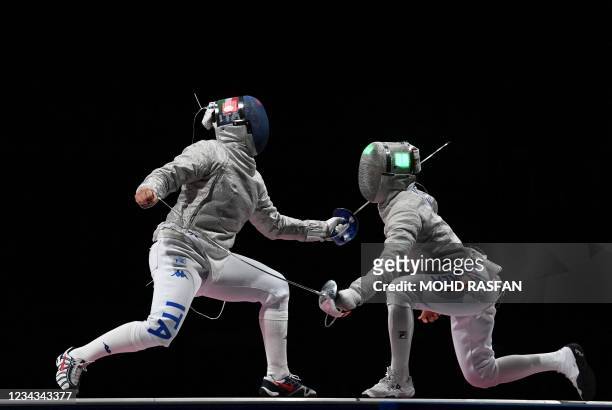 Italy's Rossella Gregorio compete against South Korea's Kim Jiyeon in the womens team sabre bronze medal bout during the Tokyo 2020 Olympic Games at...