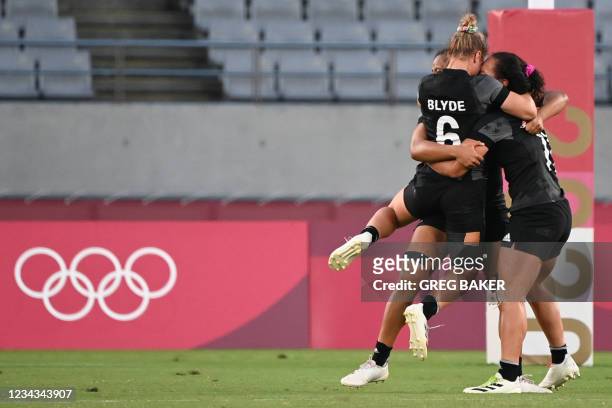 New Zealand's players celebrate after winning the women's final rugby sevens match between New Zealand and France during the Tokyo 2020 Olympic Games...
