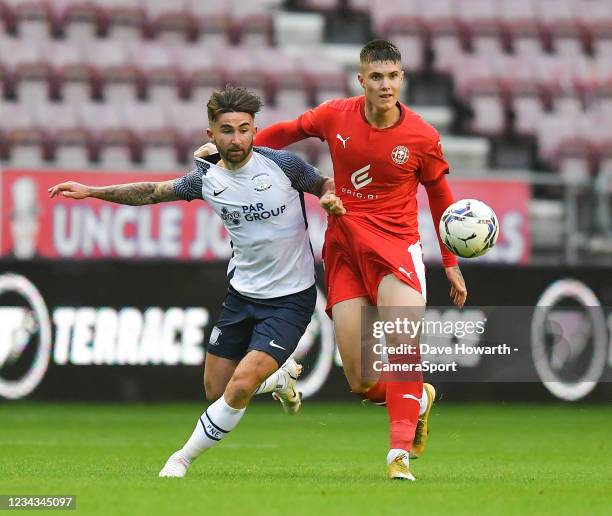 Preston North End's Sean Maguire battles for the ball during the Pre-Season Friendly match between Wigan Athletic and Preston North End at DW Stadium...