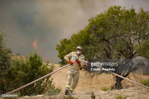 Forestry workers and firefighter teams continue to respond to the forest fire that broke out in Manavgat district of Turkeyâs Antalya on July 31,...