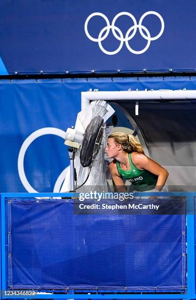 Tokyo , Japan - 31 July 2021; Zara Malseed of Ireland uses a pitchside fan to cool down during the women's pool A group stage match between Great...