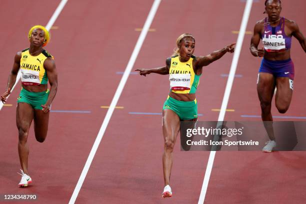 Elaine Thompson-Herah of Team Jamaica celebrates across the line after winning the Women's 100m Final on Day 8 of the Tokyo 2020 Olympic Games at...